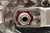 Works Red Aluminum Elite Axle Block Pair