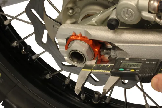 Works Orange Aluminum Elite Axle Block Pair