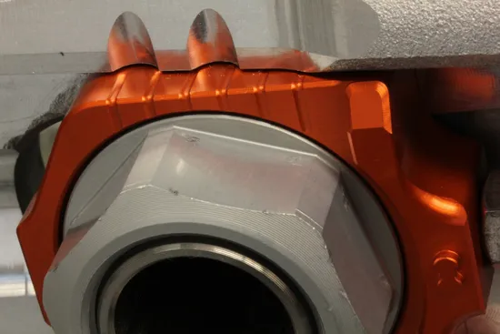 Works Orange Aluminum Elite Axle Block Pair