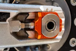Works Orange Aluminum Elite Axle Block Pair