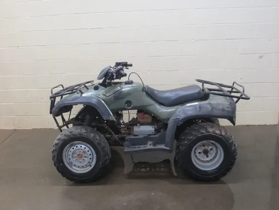 350 Rancher Outer Stator Cover from 2006 Honda ES 4x4